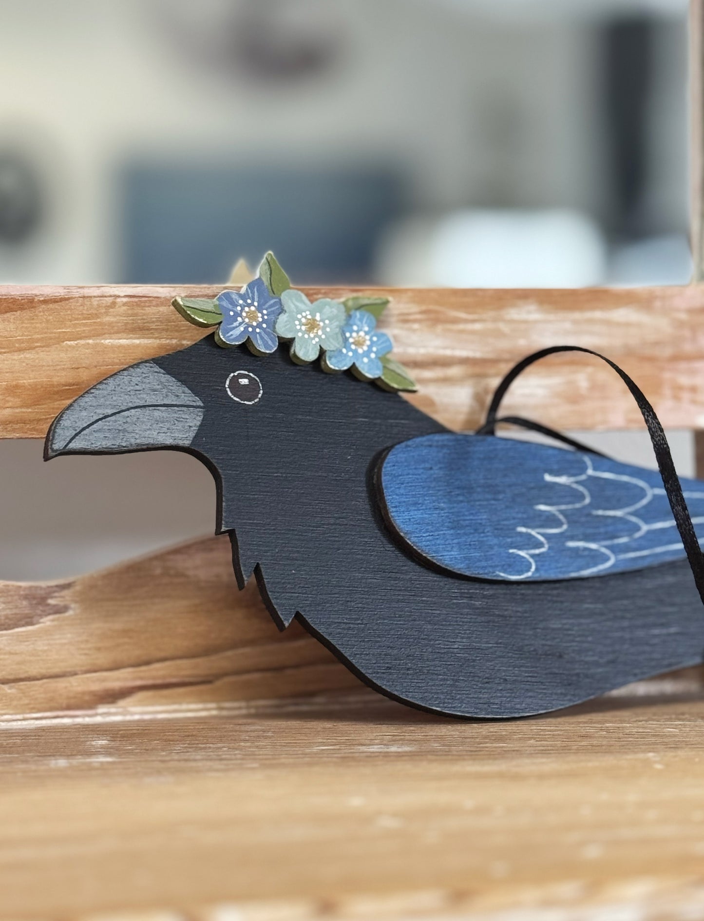 RAVEN WITH BLUE FLORAL CROWN — Hand-Painted Wooden Raven Hanging